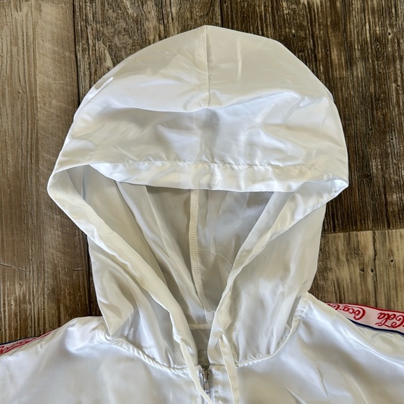 Coca-Cola Women or men
Windbreaker Jacket Size 2XL
Lightweight Pullover hood - Picture 5 of 15